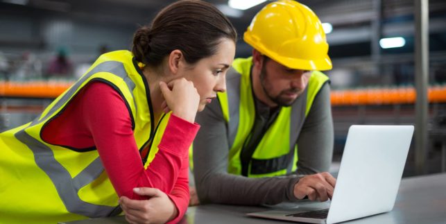 Factory,Workers,Using,Laptop,At,Drinks,Production,Factory
